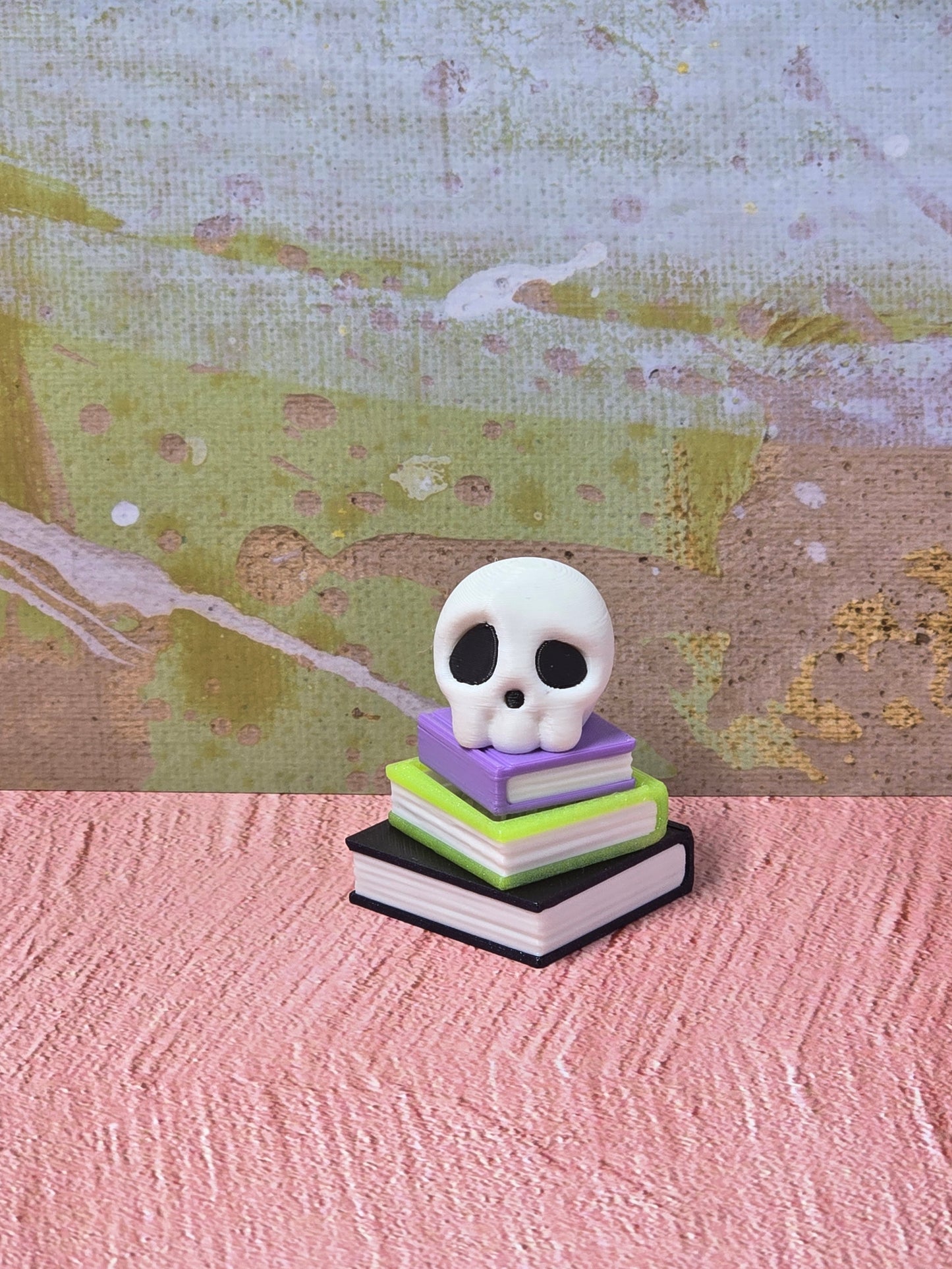 Skull on Book Stack Fidget Clicker