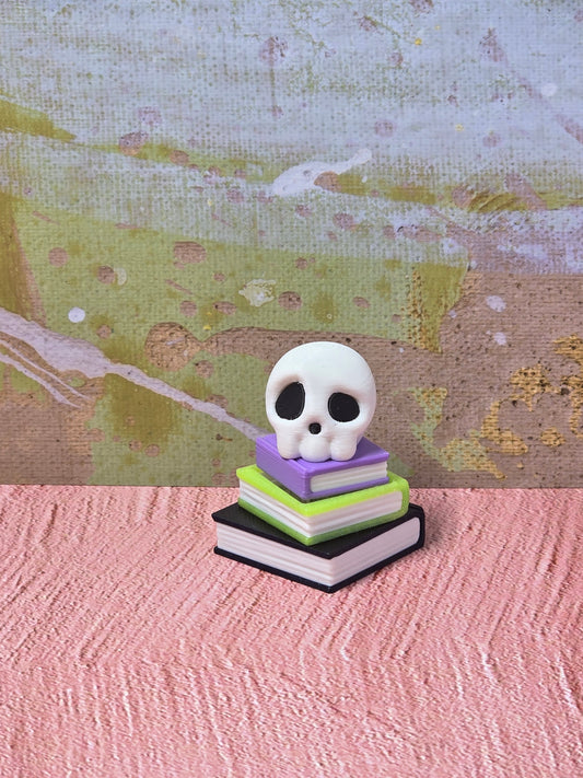 Skull on Book Stack Fidget Clicker