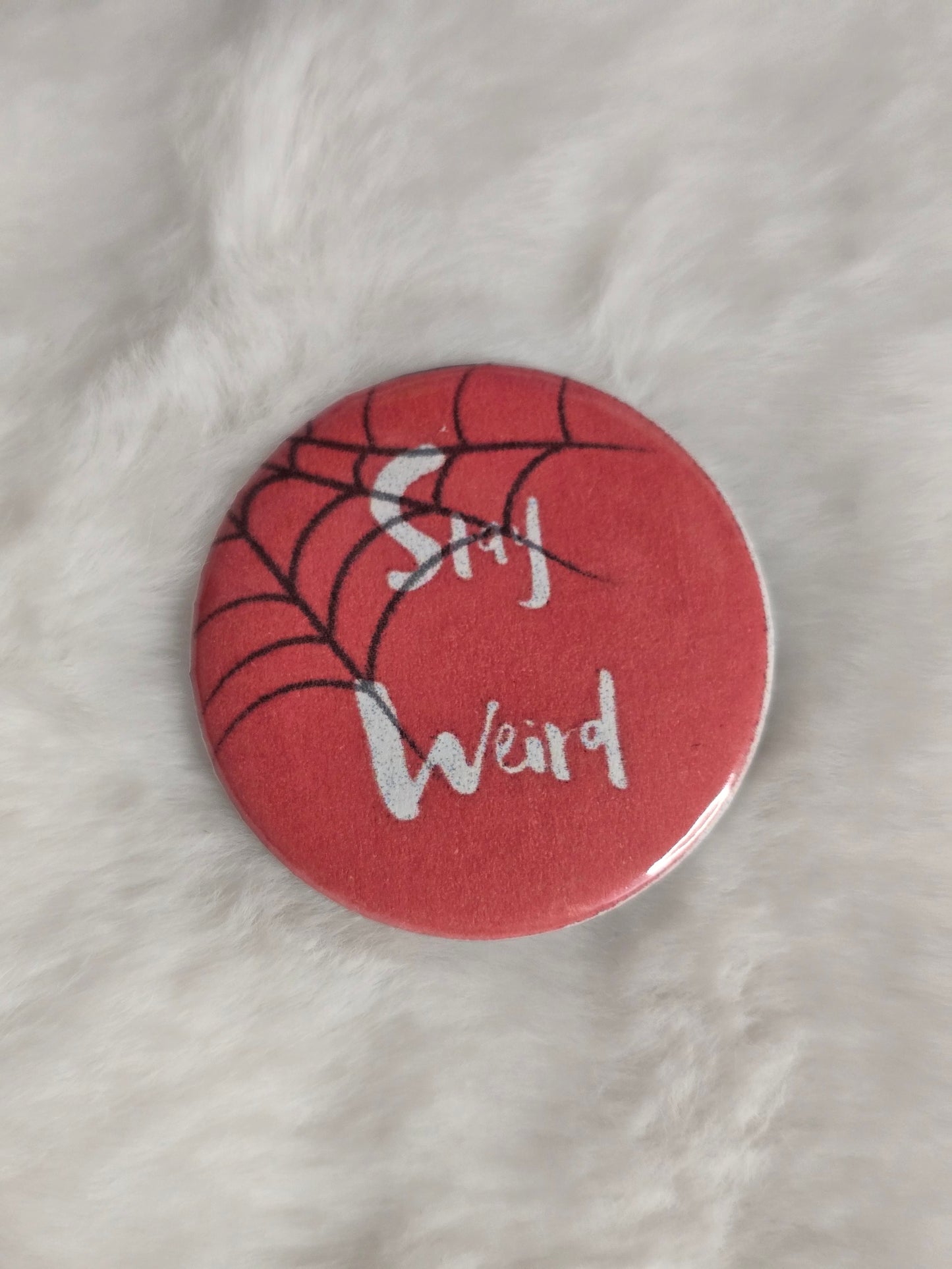 Stay weird 1.25 inch buttons
